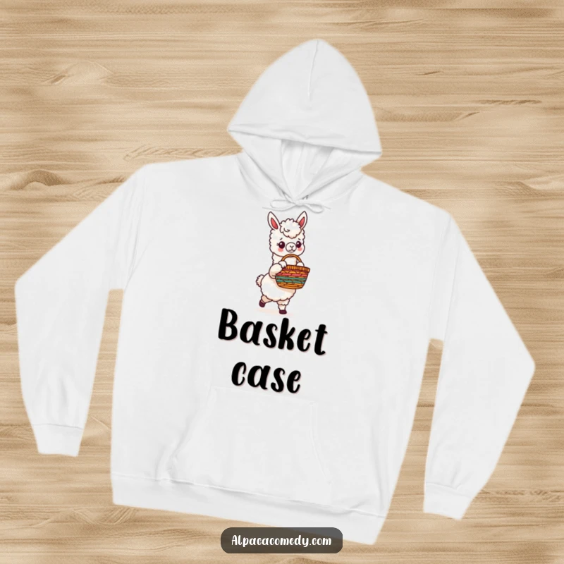 Funny hoodie with a charming alpaca character gently holding a beautifully detailed, rainbow-hued woven basket, perfect for chilly days.