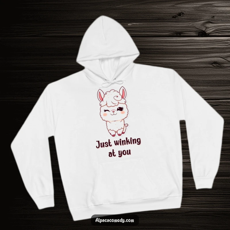 Funny Kawaii Alpaca Hoodie displaying a cute alpaca winking with long eyelashes, offering cozy comfort and playful style.